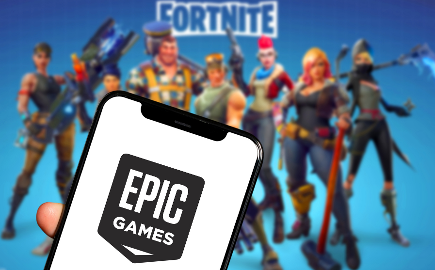 phone showing the epic games logo while initiating fortnite
